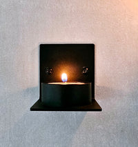 Varmelystestager væg