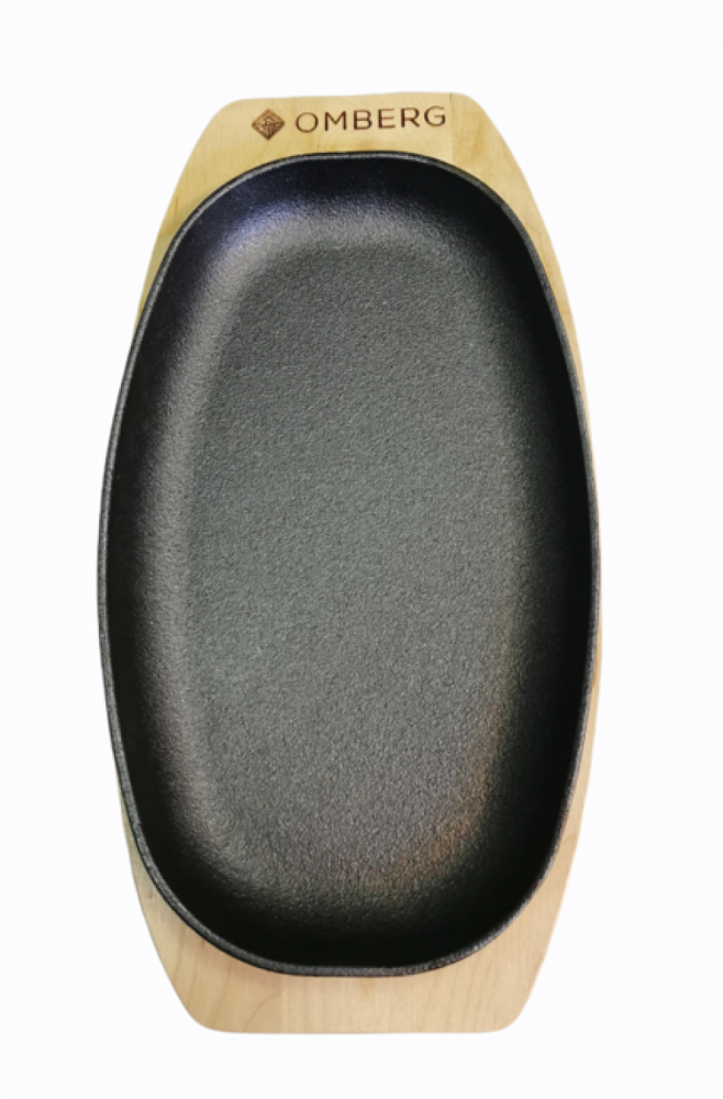Gjutjärnspanna oval med träunderlag