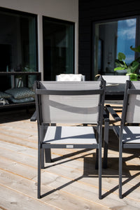 Ensemble de repas rond Marbella avec chaises Copacabana 