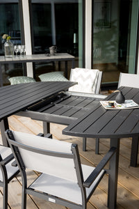 Ensemble de repas rond Marbella avec chaises Copacabana 