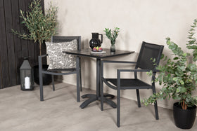 Spisebordet Colorado med stolene Copacabana 