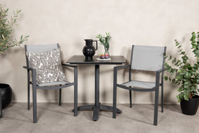 La table à manger Colorado avec les chaises Copacabana 